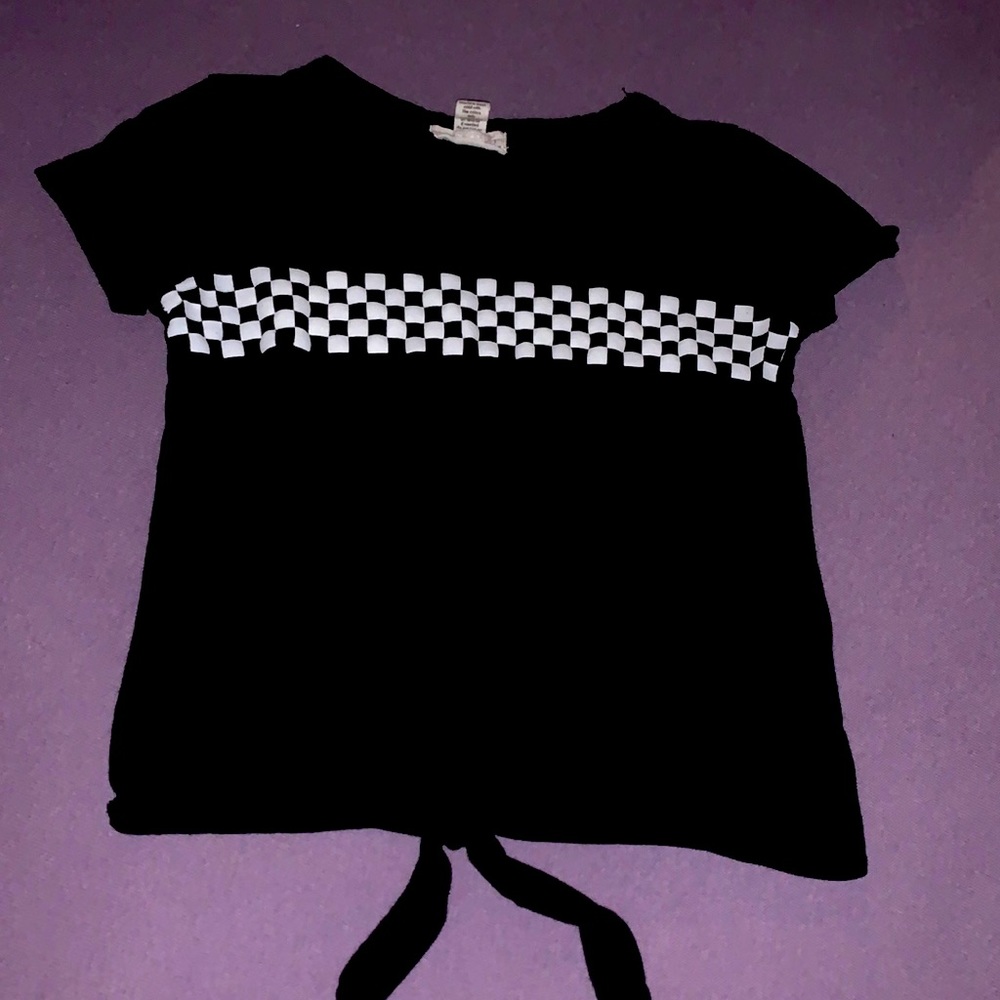 shirt with checkers and a little bow on the bottom